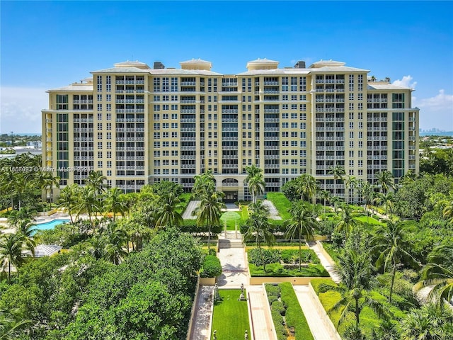 view of property featuring a community pool