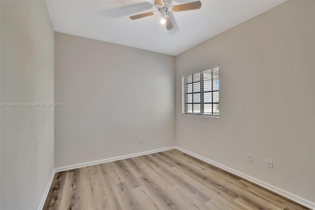 empty room featuring ceiling fan and light hardwood / wood-style flooring