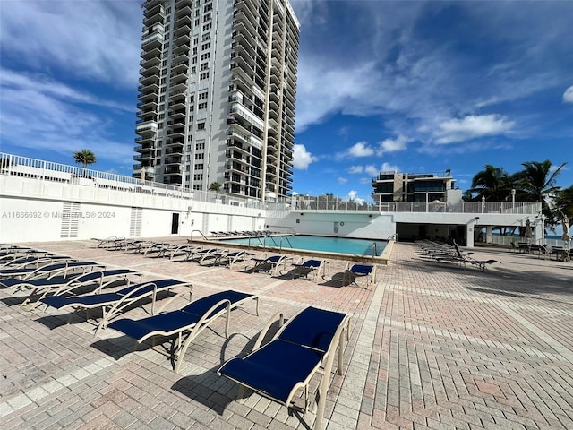 view of pool featuring a patio area