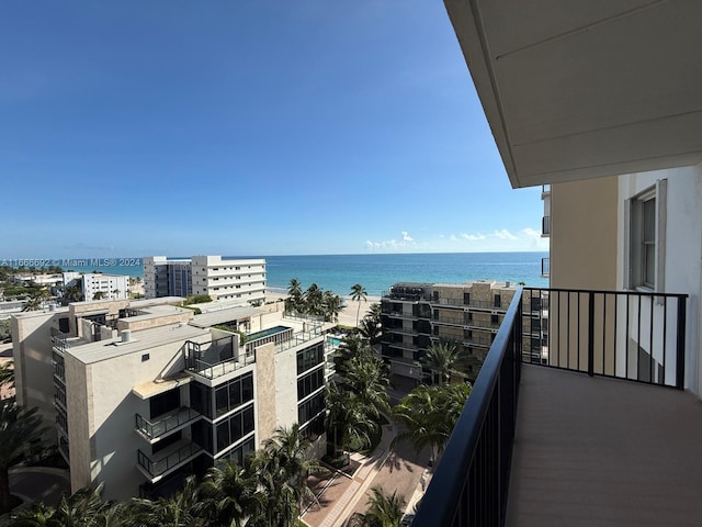 balcony featuring a water view