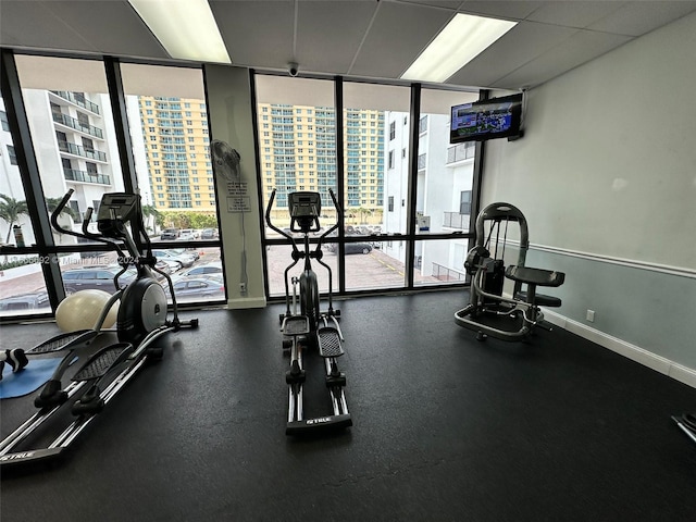 exercise room with a wall of windows