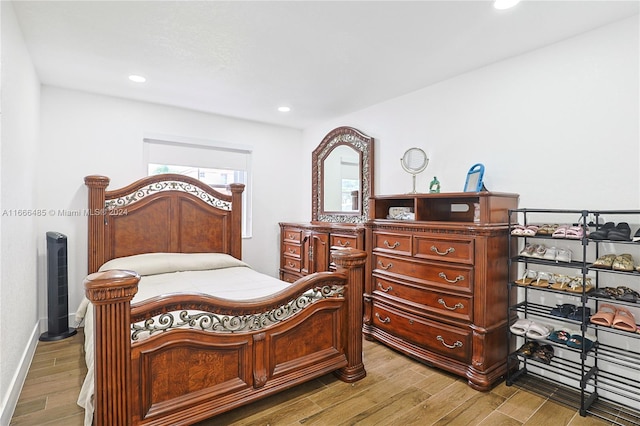 bedroom featuring wood-type flooring