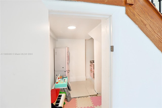 corridor featuring tile patterned floors