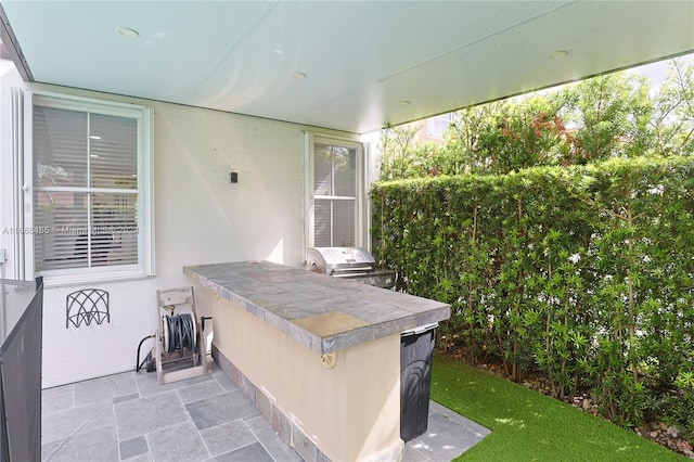 view of patio with grilling area