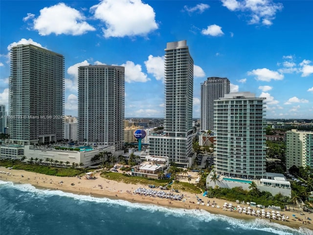 view of city with a water view and a view of the beach