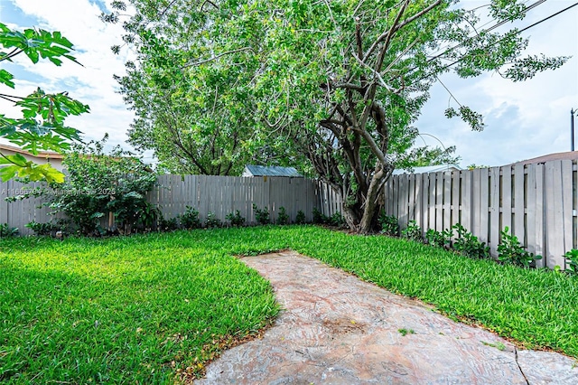 view of yard featuring a fenced backyard