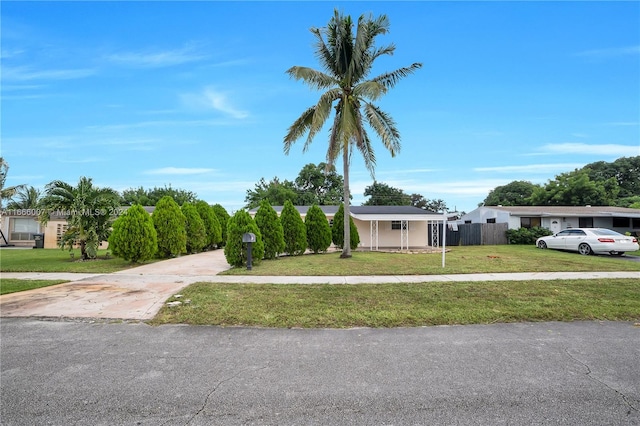 view of front facade with a front lawn