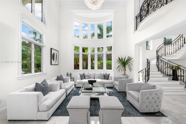 living room with a high ceiling