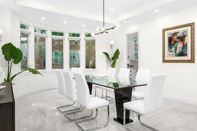 dining area featuring crown molding