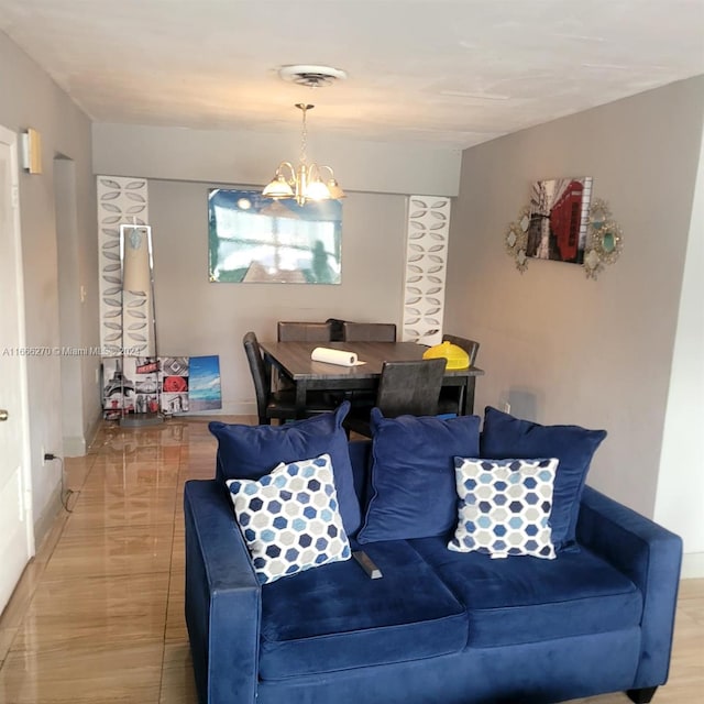 living room with a chandelier