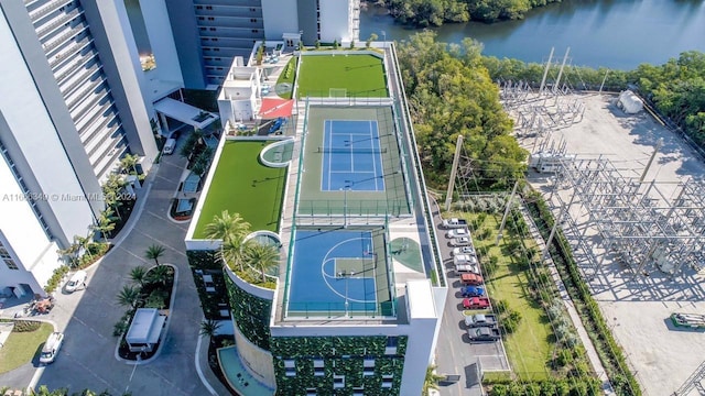 birds eye view of property featuring a water view