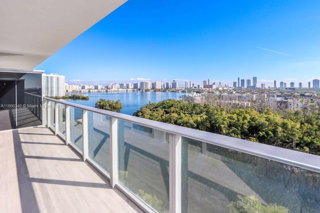 balcony featuring a water view