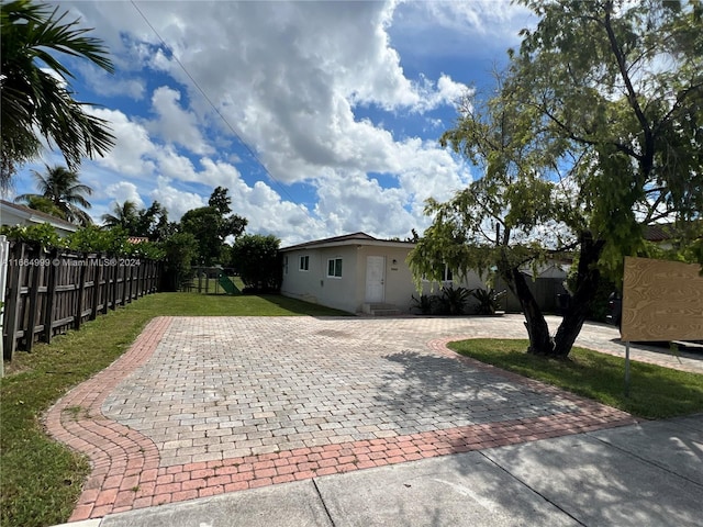 exterior space with a yard