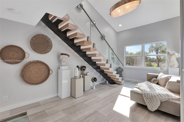 staircase featuring hardwood / wood-style flooring