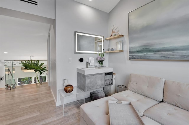 living room with light hardwood / wood-style floors