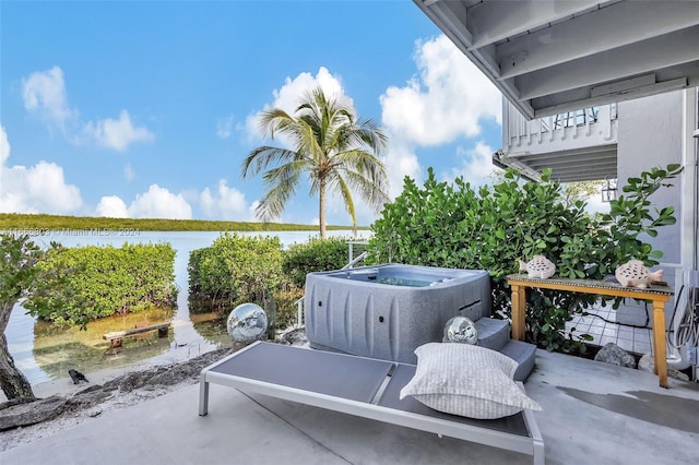 view of patio / terrace featuring a water view