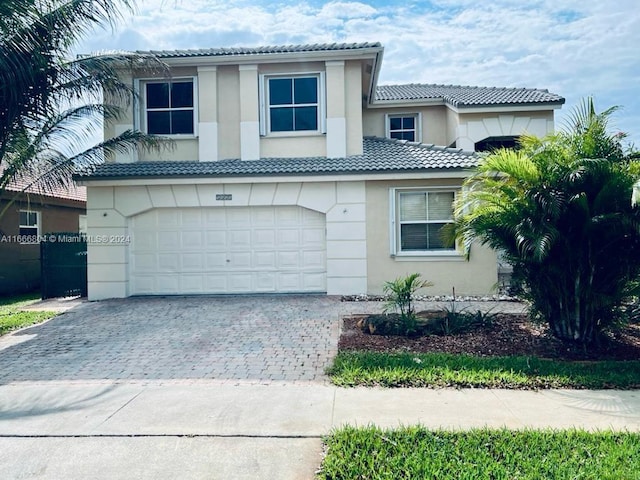 view of front of home with a garage