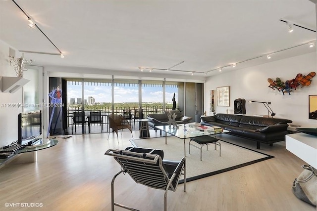 2 Grove Isle Dr Unit B1708, Miami, FL 33133 - living room with rail lighting and wood finished floors