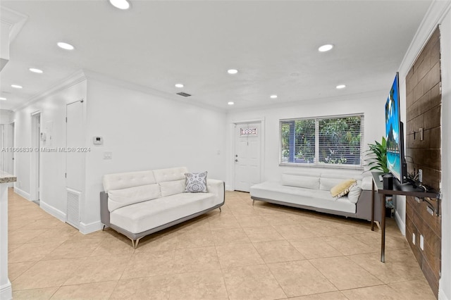 tiled living room with ornamental molding