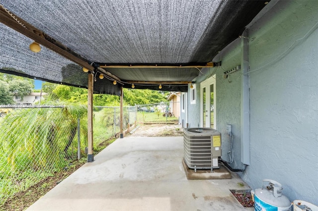 view of patio with central AC