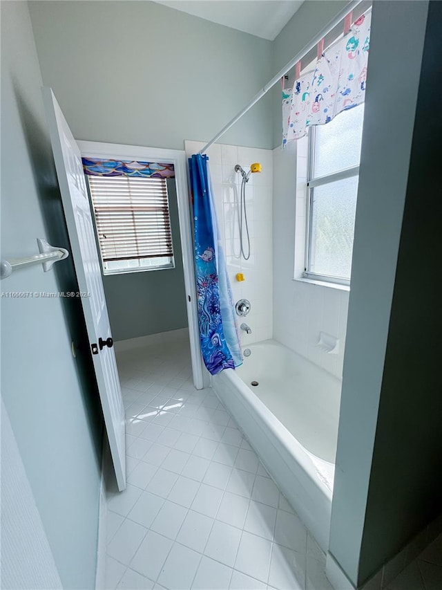 bathroom featuring tile patterned floors and shower / bathtub combination with curtain