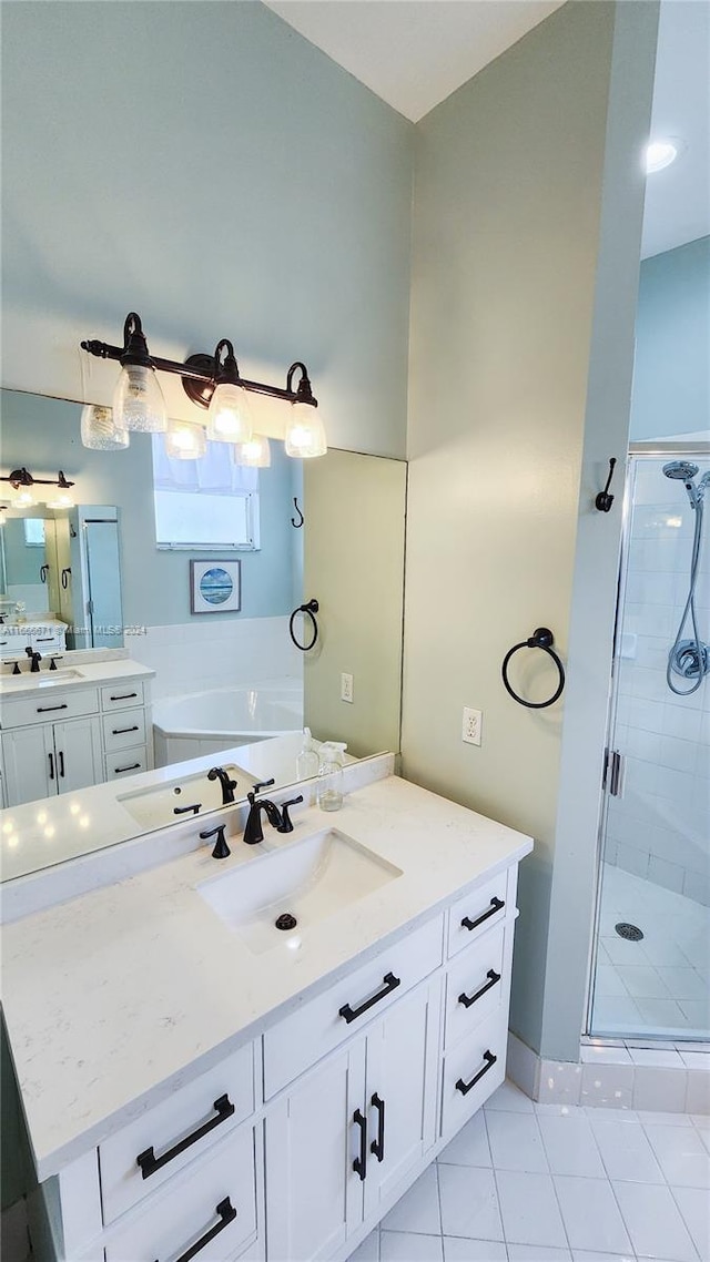 bathroom with walk in shower, tile patterned flooring, and vanity