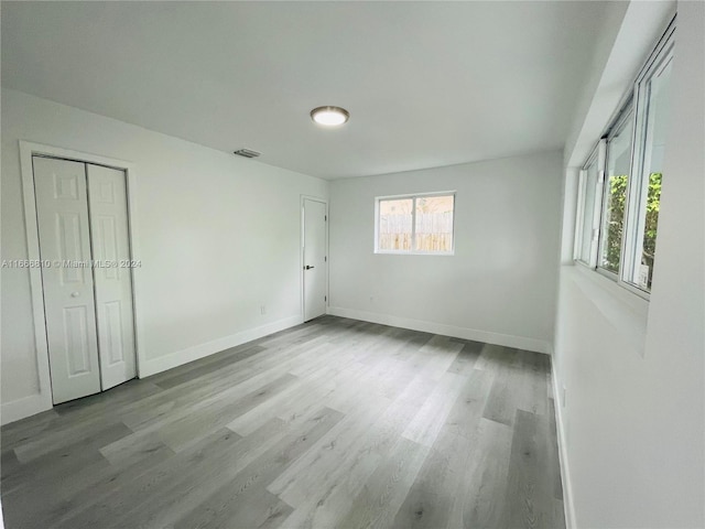 unfurnished bedroom with light hardwood / wood-style flooring