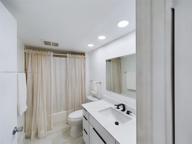 full bathroom with shower / bathtub combination with curtain, toilet, and vanity