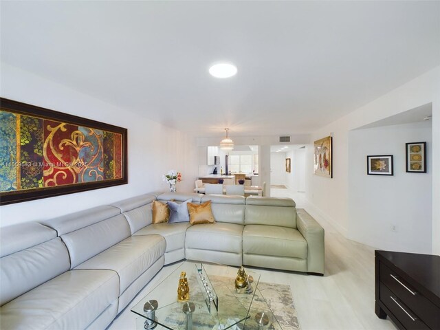 living room with light wood-type flooring