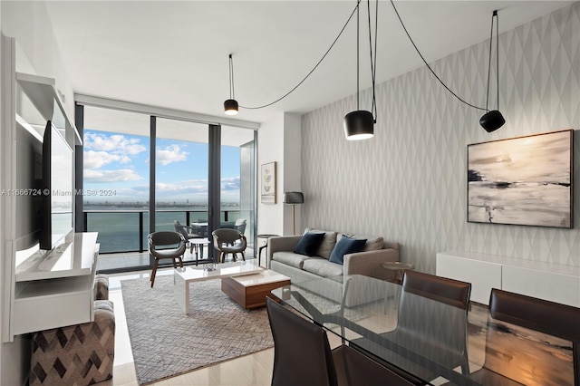 living room with floor to ceiling windows and hardwood / wood-style floors