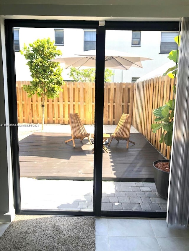 doorway to outside featuring a wealth of natural light