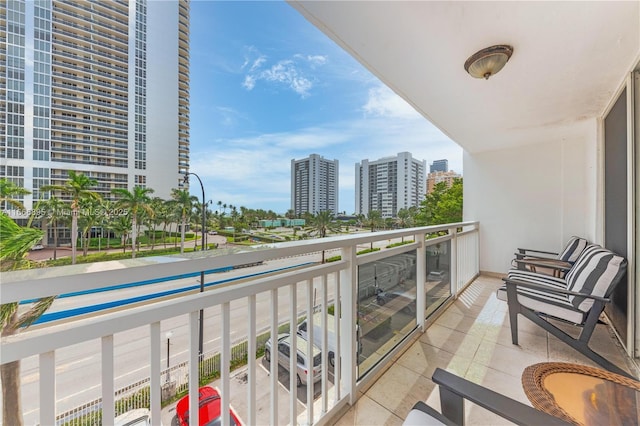 balcony featuring a city view