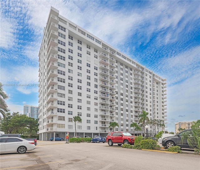 1849 S Ocean Dr Unit 415, Hallandale Beach, FL 33009 - view of apartment building / complex featuring uncovered parking