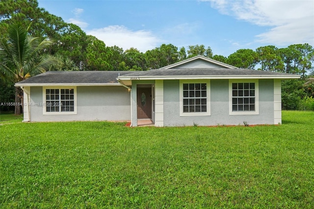 ranch-style house with a front yard