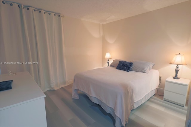 bedroom with a textured ceiling