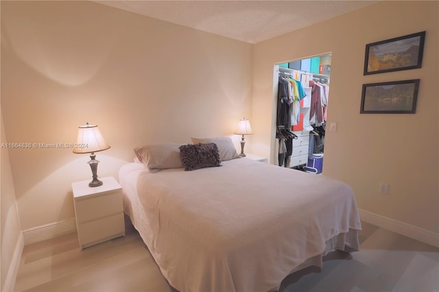 bedroom with a closet and a spacious closet