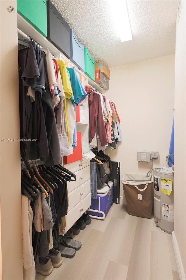 spacious closet with electric water heater