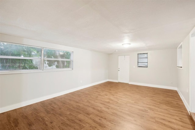 empty room with light wood-type flooring