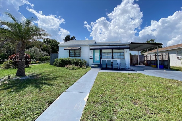 view of front of home featuring a front lawn