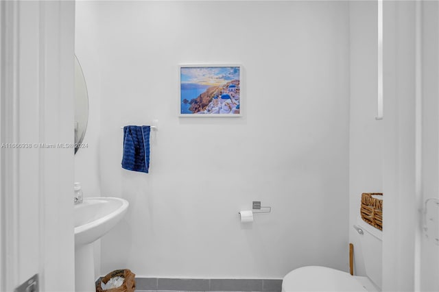 bathroom with toilet and sink