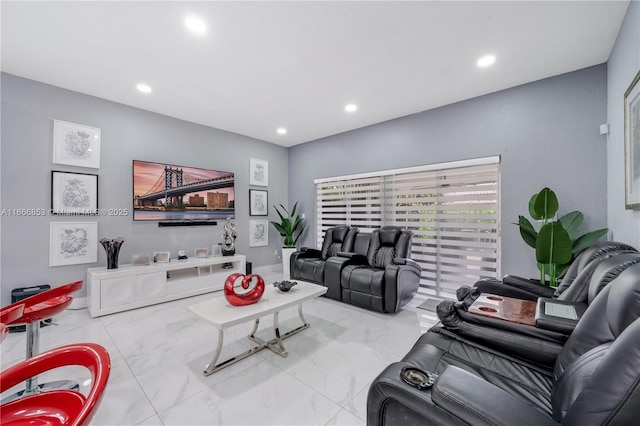 living room featuring marble finish floor and recessed lighting