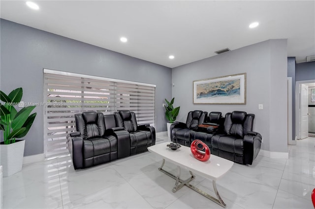 living room featuring marble finish floor, baseboards, visible vents, and recessed lighting