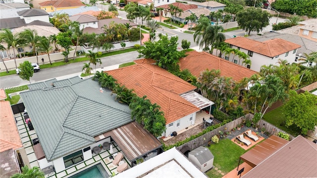 birds eye view of property with a residential view