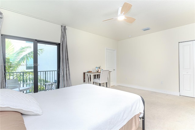 carpeted bedroom featuring access to outside and ceiling fan