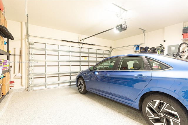 garage featuring a garage door opener