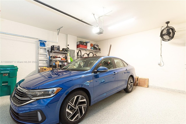 garage featuring a garage door opener