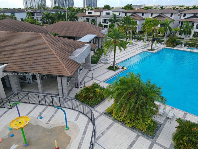 view of swimming pool with a patio