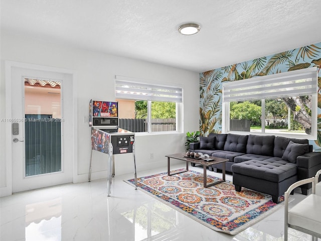 living room with a textured ceiling