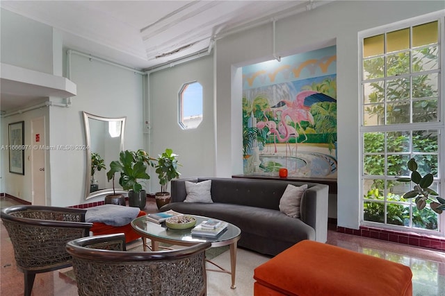 living room with carpet floors and a wealth of natural light