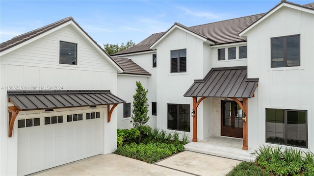 modern farmhouse with a garage